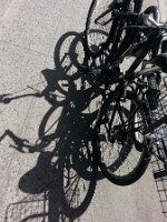 Bicycles and their shadows (W 14th St)