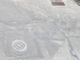 Pavement and manhole