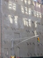 Sun reflecting off bank of windows 